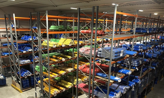Rubber sheets arranged in the racks in warehouse
